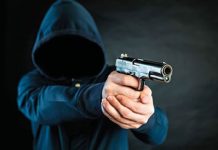 Driver in critical condition after being shot by armed robbers