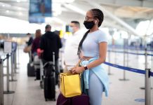 Britain considers easing restrictions for vaccinated travellers, as airlines threaten action