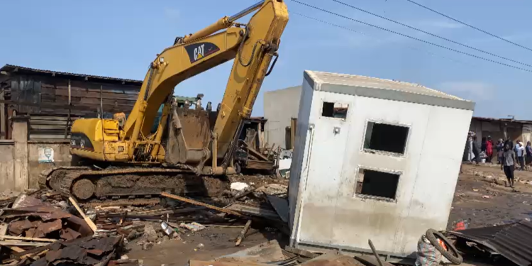 Ablekuma Central Municipal Assembly  demolishes illegal structures at Agbogbloshie onion market